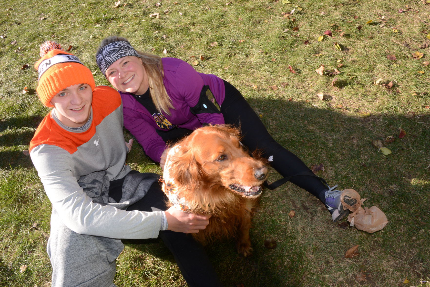 Gabe Halcomb, Katie Farney with Maggie the dog